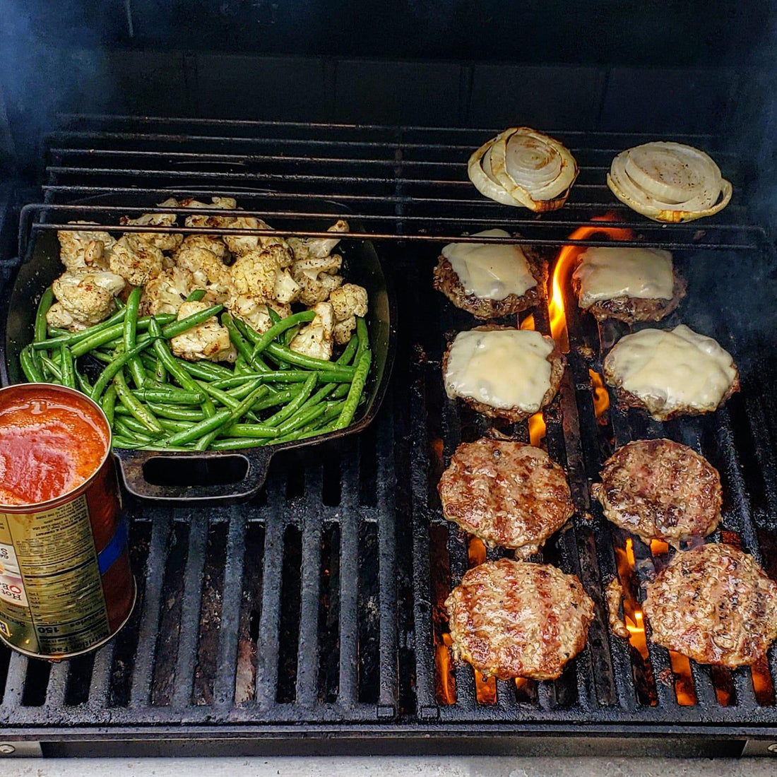 Lit up the grill for tonight’s dinner even though it was raining because.... burgers!