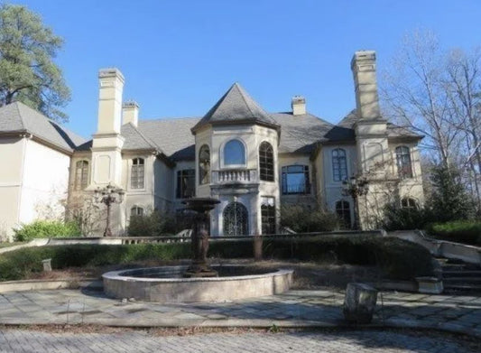 Fold ‘Em: Kenny Rogers’ Former Georgia Mansion Hits the Market for $4.2M