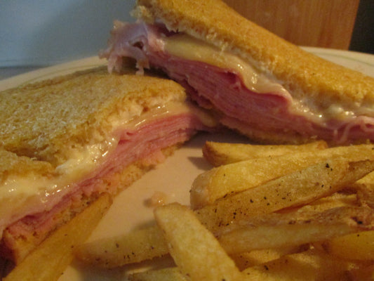 Grilled Ham and Swiss on Sour Dough Bread w/ Baked Fries