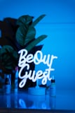 Make Your Space Welcoming and Whimsical With This Ultracute "Be Our Guest" Neon Lamp