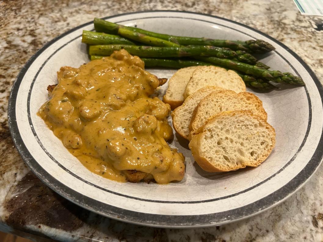 Blackened Redfish w/ Crawfish Cream Sauce